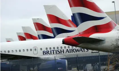  ?? Photograph: Adrian Dennis/AFP/Getty Images ?? British Airways aircraft parked at London Heathrow airport.