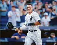  ?? Noah K. Murray / Associated Press ?? Yankees right fielder Aaron Judge reacts after his walk-off home run against the Astros during the 10th inning Sunday in New York.