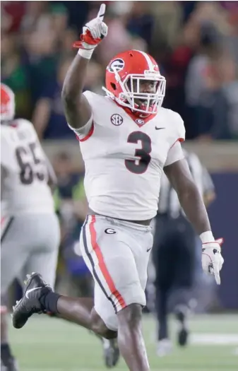  ?? (Photo by Michael Conroy, AP) ?? Georgia linebacker Roquan Smith celebrates a fumble recovery during the second half of last Saturday's game against Notre Dame.