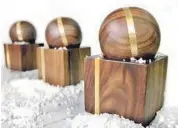  ?? The Wooden Palate ?? SALT SPHERE with brass inlay, $200, by the Wooden Palate.