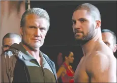  ?? Associated Press photo ?? This image released by Metro Goldwyn Mayer Pictures / Warner Bros. Pictures shows Dolph Lundgren, left, and Florian Munteanu in a scene from “Creed II.”