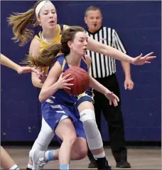  ?? Photo courtesy of Texas Wesleyan ?? John Brown sophomore Taylor Fergen drives by a Texas Wesleyan defender during Saturday’s game. The Rams defeated the Golden Eagles 69-61.