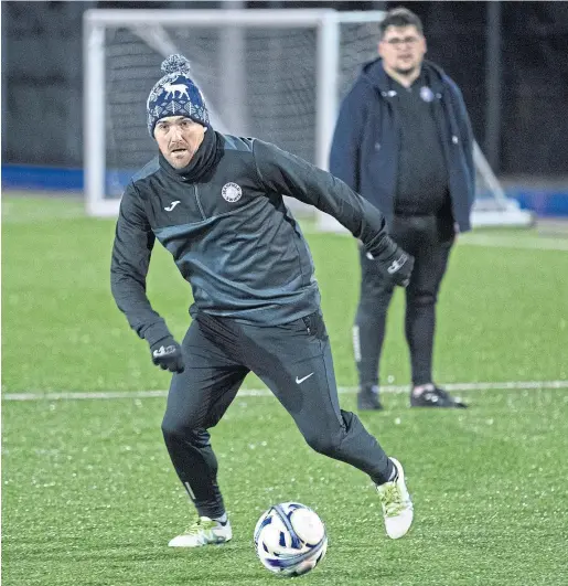  ?? Pictures: PPA. ?? Jeanfield Swifts boss Ross Gunnion taking training at McDiarmid Park. The club has big plans for the future with the current manager central to their ambitions.