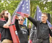  ?? HYOSUB SHIN PHOTOS/ HSHIN@AJC.COM ?? The National Socialist Movement holds a rally at Greenville Street Park in downtown Newnan on April 21. Accounting documents show the city spent $111,589 on security for the rally.