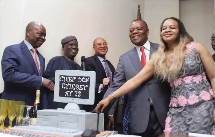  ??  ?? R-L: Mrs. Imabong Etiebet, Chief Don Etiebet, Prof. Pat Utomi, Chief Olawale Ige, and Dr. Thomas John, cutting Etiebet’s 73rd birthday cake at the event