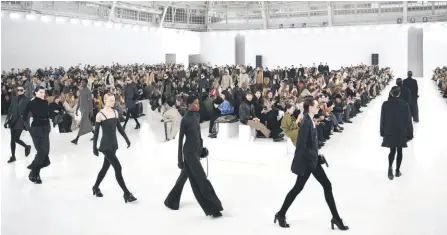  ?? — AFP photo ?? Models walk the runway during the Max Mara collection show at the Milan Fashion Week Womenswear Autumn/ Winter 2024-2025 in Milan.