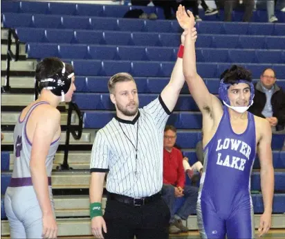  ?? PHOTOS BY BOB MINENNA ?? Lower Lake’s Gilberto Orozco needed only 39seconds to pin his Fort Bragg opponent at 147pounds Wednesday night in Lower Lake where the host Trojans won 54-12. They are now 3-0 in the Coastal Mountain Conference standings.