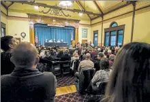  ?? SENTINEL & ENTERPRISE FILE PHOTO ?? Townsend residents pack into the special town meeting in March 2017.