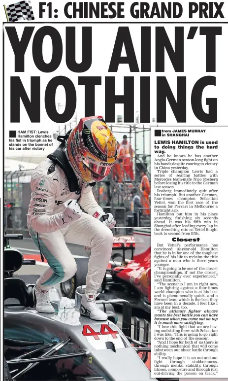  ??  ?? HAM FIST: Lewis Hamilton clenches his fist in triumph as he stands on the bonnet of his car after victory