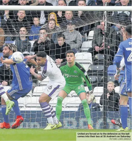  ?? PICTURE: LEWIS ARNOLD ?? United are forced on to the defensive as the ball comes into their box at St Andrew’s on Saturday