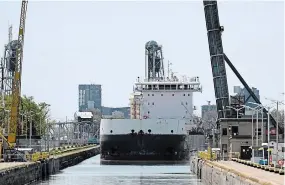  ?? DAVE JOHNSON TORSTAR ?? Algoma Equinox lines up to head upbound on the Welland Canal at Bridge 19A in Port Colborne.