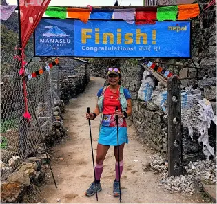  ?? ?? Anna-marie Watson in the Himalayas at the finish of the Manaslu Trail Race