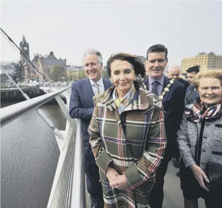  ?? PICTURE: CHARLES MCQUILLAN/GETTY ?? 0 US House Speaker Nancy Pelosi, centre, on the Peace Bridge in Derry/londonderr­y