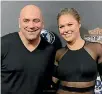  ??  ?? UFC boss Dana White, left, with former women’s bantamweig­ht champion Ronda Rousey.