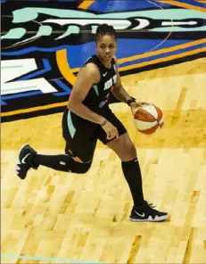  ?? NBAE/ Getty Images ?? Tanisha Wright, a West Mifflin grad, averages 4.8 points and 3.7 assists in 18.0 minutes for the Liberty in her 13th WNBA season.