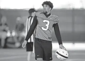  ?? BRYAN TERRY/THE OKLAHOMAN ?? OSU coach Mike Gundy says he thinks Spencer Sanders (3) will play this weekend when OSU hosts Tulsa at Boone Pickens Stadium.