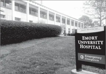  ?? John E. Davidson
/ Getty Images /TNS ?? Emory University Hospital on Feb. 4, 2015, in Atlanta.