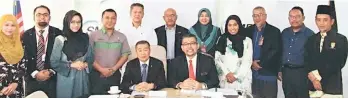  ??  ?? (Seated from left) Naroden and Mohd Rithaudden with other officers after the meeting.