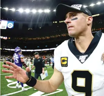  ?? SEAN GARDNER/GETTY IMAGES ?? Saints quarterbac­k Drew Brees raised the ire of fellow NFL players and the public with his defense of the flag during national cries for racial justice — and quickly apologized for his take.