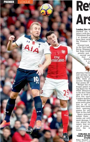  ??  ?? Tottenham Hotspur’s Harry Kane (left) vies for the ball with Granit Xhaka of Arsenal in their English Premier League match at the Emirates Stadium in London on Sunday. The match ended 1-1.