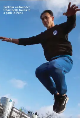  ??  ?? Parkour co-founder Chau Belle trains in a park in Paris