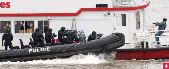  ??  ?? Firefight: Officers – all clad in black – shoot at a ‘terrorist’ as they prepare to board the boat close to the Docklands area 4