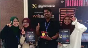  ??  ?? Dr Mahendran Sekar (second from right) holding the gold award with his team members, Puteri Zarith Sofea Yusri (left), Nurul Azima Mazlan and Nurin Fatini Ghazali.