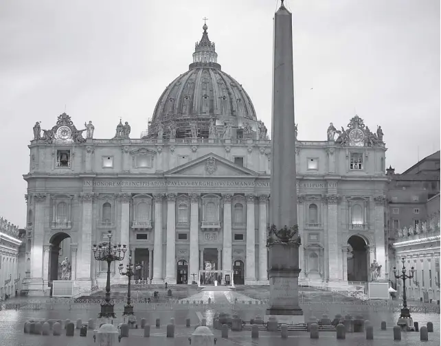  ?? AP/ALESSANDRA TARANTINO ?? POPE Francis, white figure standing alone at center, delivers an Urbi et orbi prayer from the empty St. Peter’s Square, at the Vatican, March 27, 2020.