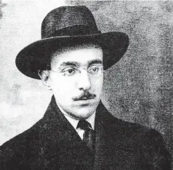  ?? Marka / Universal Images Group via Getty Images ?? Pessoa, pictured in 1914, created dozens of well-rounded personas.