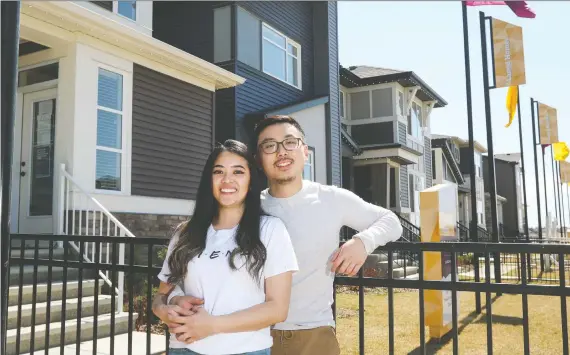  ?? CHRISTINA RYAN ?? Dianne Dizon and Simon Chiem have moved into their Morrison Homes house in the community of Cornerston­e, to be close to friends and family.