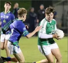  ??  ?? Lee Cushe of Naomh Eanna taking on Corben Brown (Glynn-Barntown)