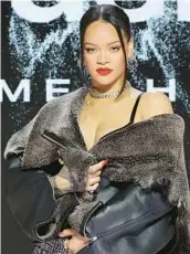  ?? MIKE COPPOLA/GETTY ?? Rihanna is seen Thursday at an event in which she discussed Sunday’s Super Bowl halftime show.