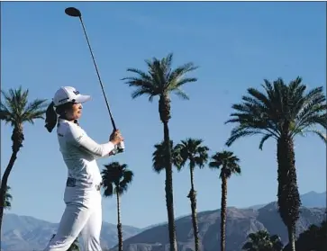  ?? Chris Carlson Associated Press ?? ON A FLAWLESS day in the desert, Jin Young Ko almost matched the conditions with a brilliant front nine at Mission Hills Country Club. The South Korean stumbled near the finish but still leads by one shot.