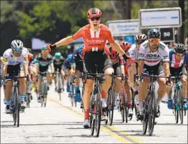 ?? Photograph­s by Wally Skalij Los Angeles Times ?? CEES BOL celebrates at the finish line after winning Stage 7 of the Tour of California. Bol won the group sprint ahead of three-time world champion Peter Sagan.