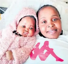  ??  ?? Makabongwe Mabaso mourns the death of her three-month-old baby Simikahle Mthethwa, who was found dead in her home