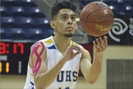  ??  ?? Brawley Union High’s Adalberto Lopez prepares to shoot a freethrow during the CIF San Diego Section Div. IV championsh­ip game against Olympian at Jenny Craig Pavilion at the University of San Diego on Friday afternoon. KARINA LOPEZ PHOTO