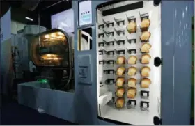  ?? AP PHOTO/JOHN LOCHER ?? The Breadbot automatic bread baking machine is on display at the Wilkinson Baking Company booth during CES Unveiled at CES Internatio­nal, Sunday, Jan. 6, 2019, in Las Vegas.