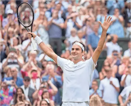  ?? SUSAN MULLANE/USA TODAY SPORTS ?? Of Roger Federer’s 20 Grand Slam tournament titles, eight have come at Wimbledon, including his most recent in 2017.