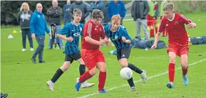  ??  ?? Fairmuir beat Forfar Boys (blue/black) in the U/15 East Region Cup at Graham Street.