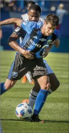  ?? THE ASSOCIATED PRESS ?? Philadelph­ia Union’s Warren Creavalle, back, battles with Montreal Impact’s Alejandro Silva as they vie for possession of the the ball Saturday in Montreal.