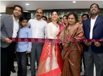  ??  ?? Tamannaah Bhatia and M.P. Ahammed’s wife Subaida K.P. inaugurati­ng the new showroom.