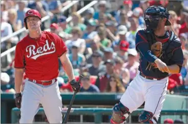  ?? ROSS D. FRANKLIN / ASSOCIATED PRESS ?? The Reds’ Jay Bruce (left) says he’ll follow the new rules forcing him to stay in the batter’s box during at-bats. He’ll concentrat­e instead on improving his average from last season’s disappoint­ing .217.