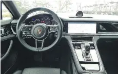  ??  ?? The Panamera’s interior layout mirrors the cockpit style of the first-generation model, though with touch-sensitive surfaces replacing many of the classic hard keys.