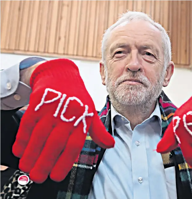  ??  ?? Jeremy Corbyn during his two-day visit to Scotland. The gloves refer to Glasgow North candidate Pam Duncan-glancy