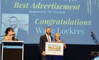  ?? PHOTO: CONTRIBUTE­D ?? The Chronicle’s media advertisin­g manager Deb Hanfeld presents Wade Lockrey with his Best Advertisem­ent award.