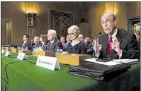  ?? Bloomberg News/ZACH GIBSON ?? Scott Garrett (right), President Donald Trump’s nominee to lead the Export-Import Bank, speaks in front of the Senate Banking, Housing and Urban Affairs Committee during a confirmati­on hearing last month in Washington.