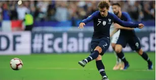  ?? (Gonzalo Fuentes/Reuters) ?? FRANCE’S ANTOINE GRIEZMANN scores his team’s second goal from the penalty spot yesterday in the League A Group 1 match between France and Germany in the Stade de France in Paris.