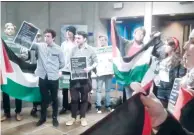  ?? (Facebook) ?? MEMBERS OF Students for a Just Palestine protest a scheduled lecture by Ambassador to Ireland Ze’ev Boker at Trinity College in Dublin, Ireland, yesterday.