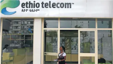  ?? /Reuters ?? Attractive asset: An EthioTelec­om office in Ethiopia’s capital, Addis Ababa. SA’s MTN Group and Vodacom Group have long sought stakes in the Ethiopian phone market and are likely to consider viable opportunit­ies.