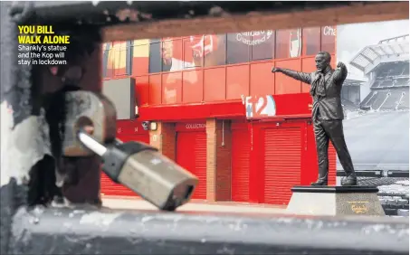  ??  ?? YOU BILL WALK ALONE Shankly’s statue and the Kop will stay in lockdown